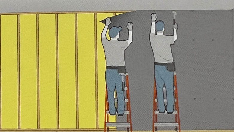 two people installing noise barrier