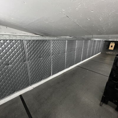 Acoustic Quilted Fiberglass Absorbers in Shooting Range